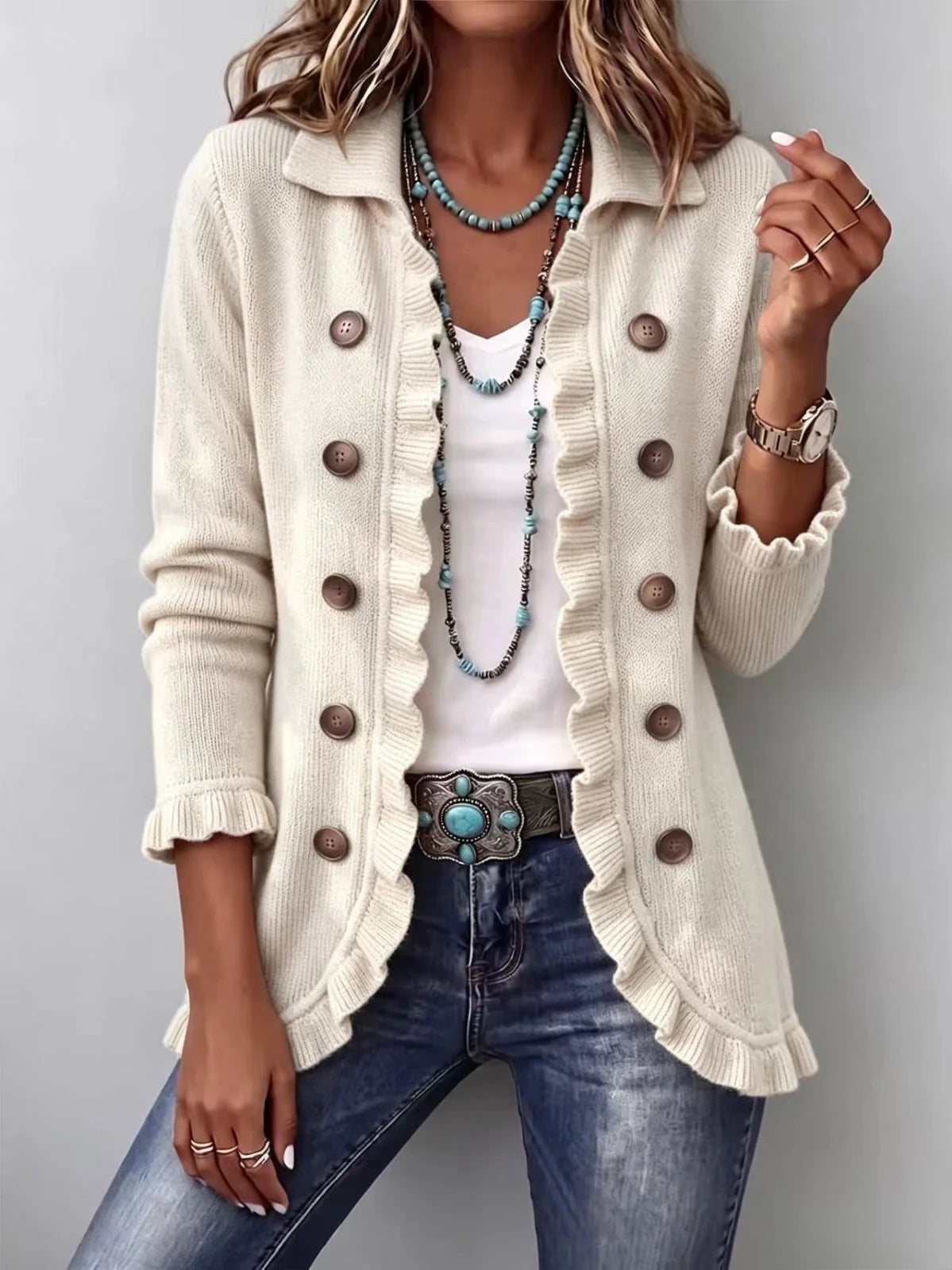 Chaqueta de punto marfil con volantes