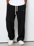 Pantalones suaves de pierna ancha