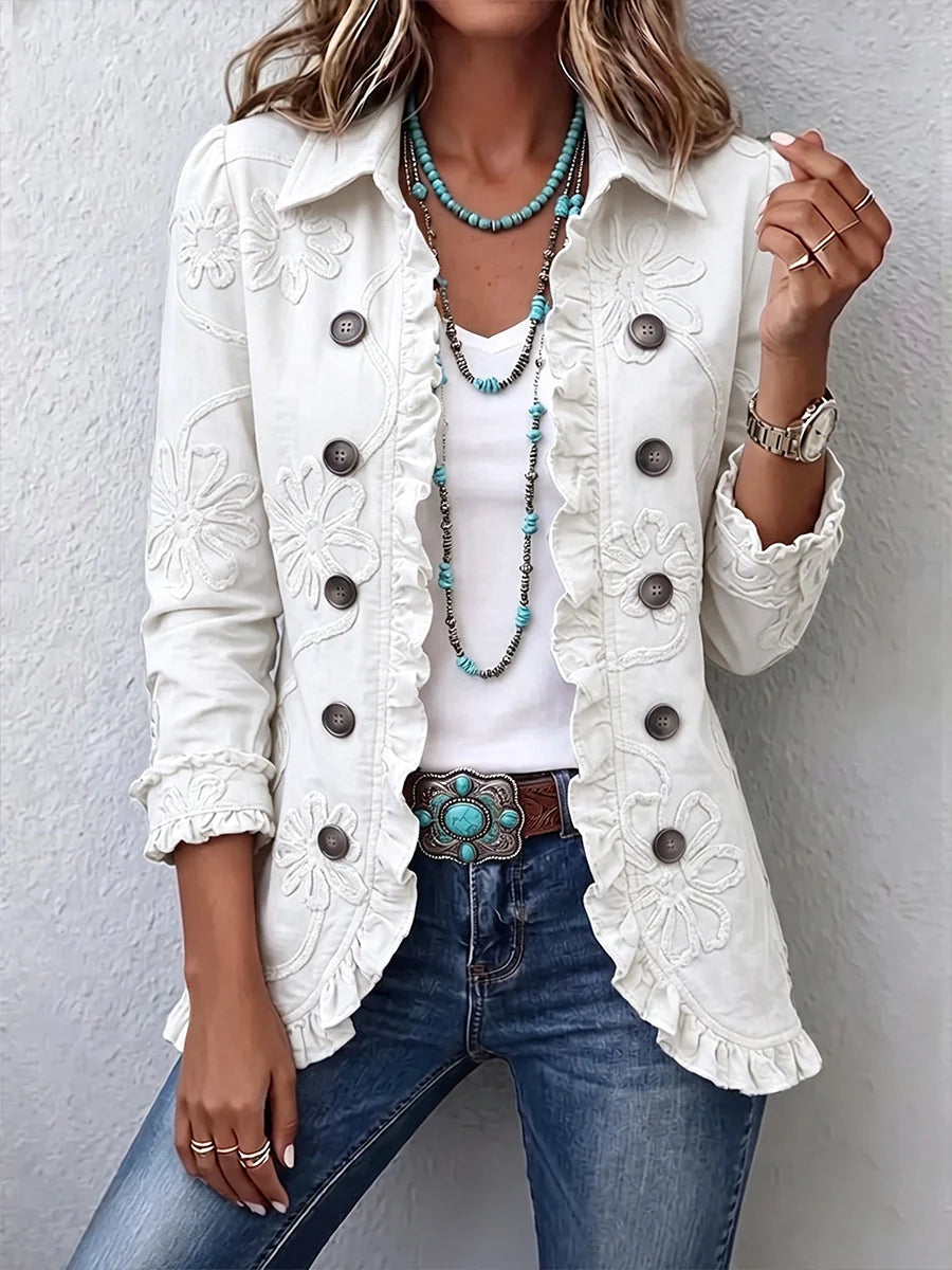 Chaqueta bordada en marfil con volantes