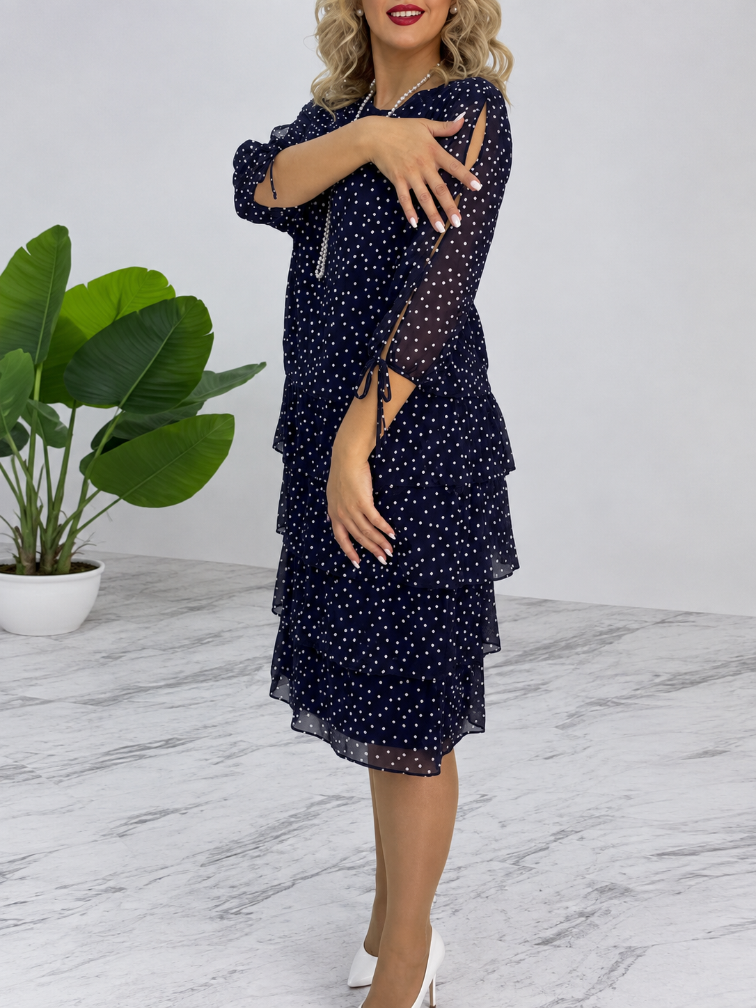 Vestido midi con volantes y lunares