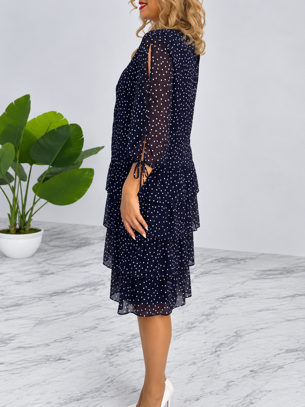 Vestido midi con volantes y lunares