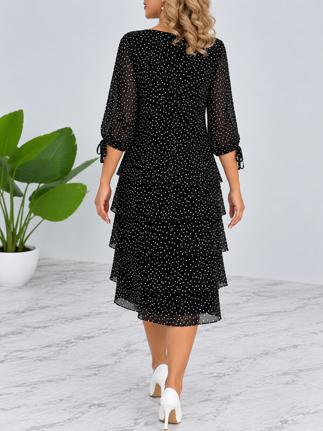 Vestido midi con volantes y lunares
